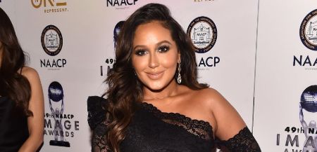 Adrienne grew up in the Lower East Side of Manhattan.